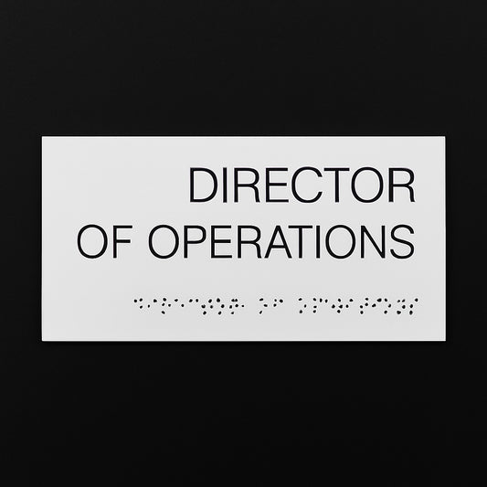 Braille alfabesiyle hazırlanmış otel ve ofis kapı isimliği, beyaz kabartma harflerle erişilebilir tasarım.