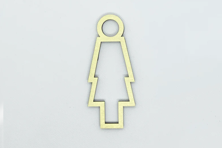 Duvara sabitlenmiş gold tuvalet işareti detayı