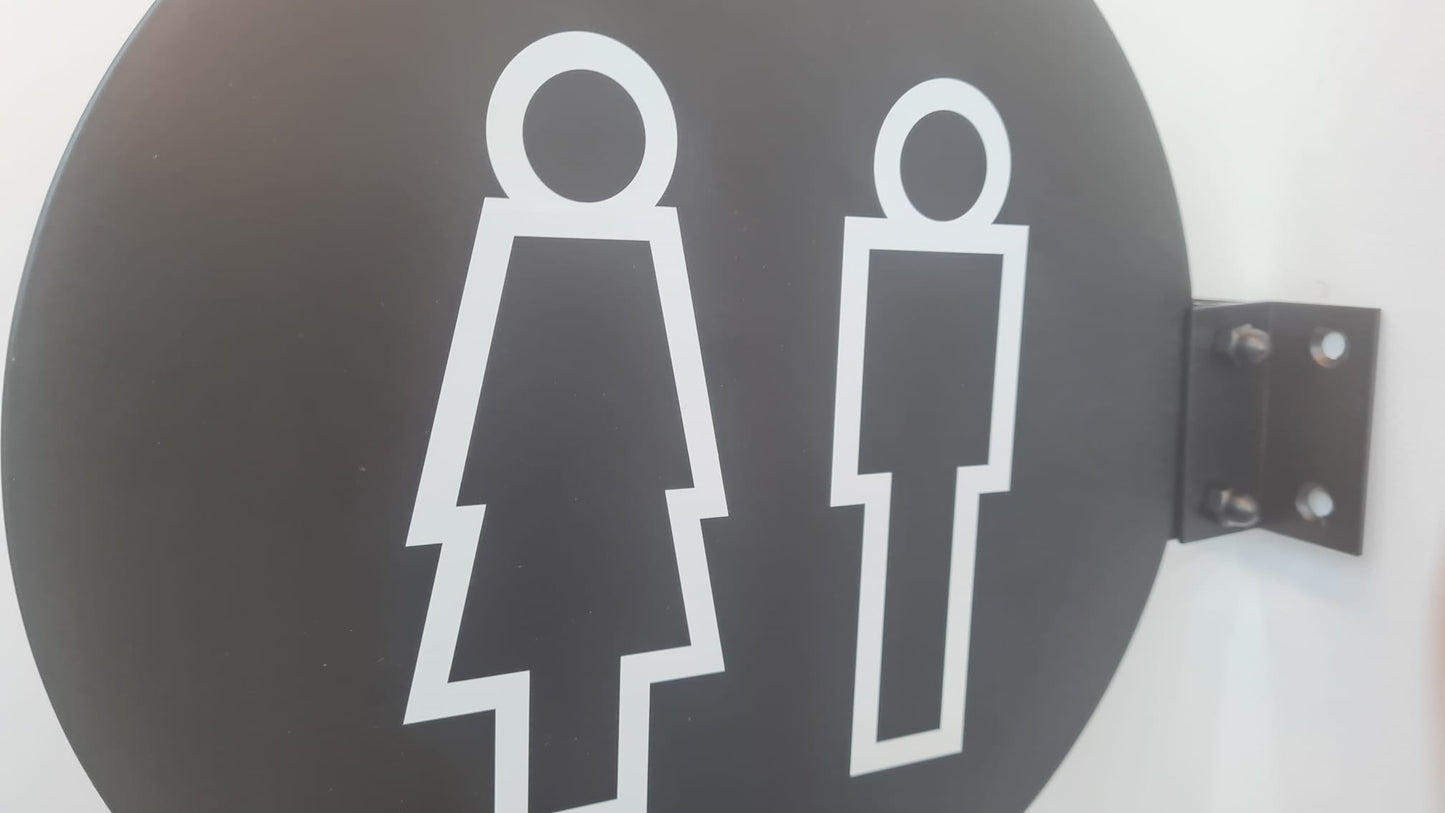 Kadın ve erkek sembollü, estetik yuvarlak WC tabelası.

