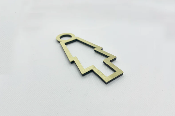 Ofis ortamına monte edilmiş kadın-erkek tuvalet yönlendirme levhası